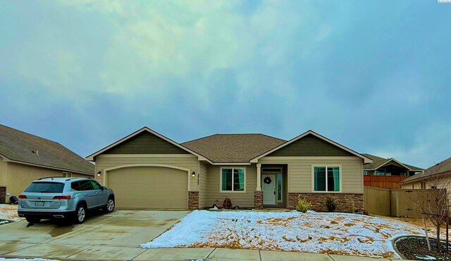 view of front of property with a garage