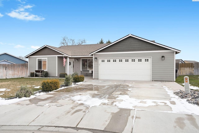 ranch-style house featuring a garage