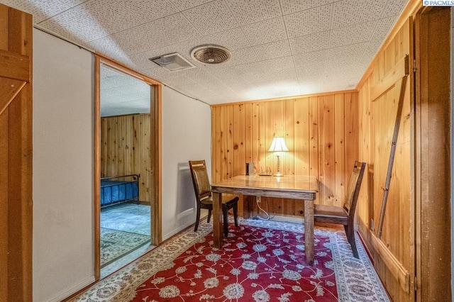 1706 Gaillard Pl, Richland, WA 99354 - office space featuring wooden walls, baseboards, and carpet flooring