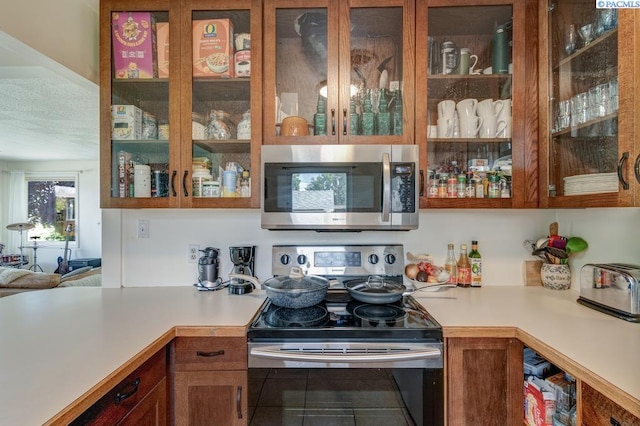 1706 Gaillard Pl, Richland, WA 99354 - bar with stainless steel appliances and tile patterned flooring