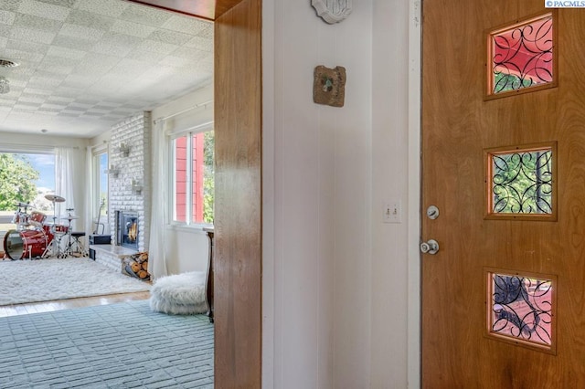 1706 Gaillard Pl, Richland, WA 99354 - entryway with healthy amount of natural light and a brick fireplace