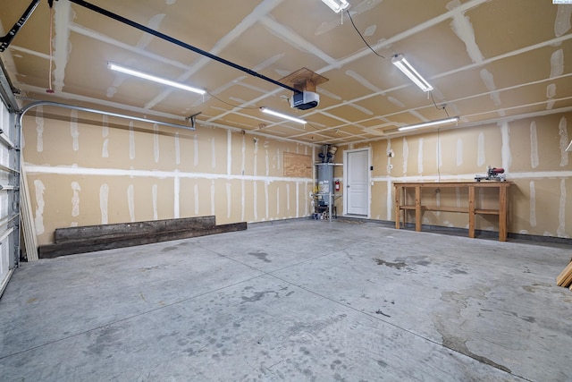 3313 Aqueduct Ln, Pasco, WA 99301 - garage with gas water heater and a garage door opener