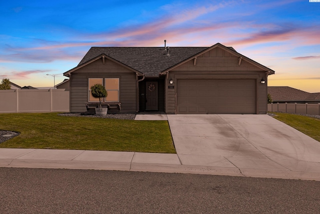 3313 Aqueduct Ln, Pasco, WA 99301 - view of front facade with a garage, driveway, and a shingled roof