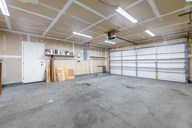 3313 Aqueduct Ln, Pasco, WA 99301 - garage with a garage door opener and electric panel