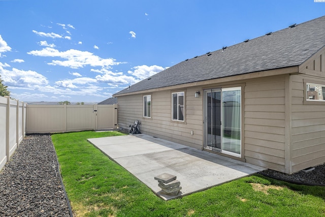 3313 Aqueduct Ln, Pasco, WA 99301 - back of property with a patio area, a shingled roof, and a gate