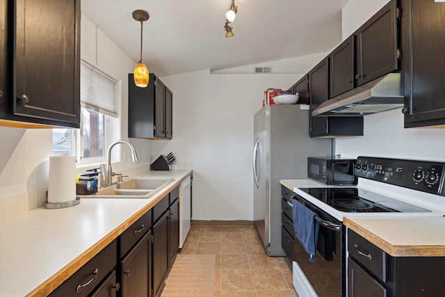 4763 Poppy St, West Richland, WA 99353 - kitchen with range with electric stovetop, hanging light fixtures, sink, and dark brown cabinets