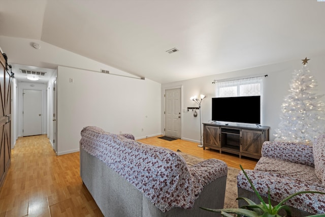 4763 Poppy St, West Richland, WA 99353 - living room with lofted ceiling and light wood-type flooring