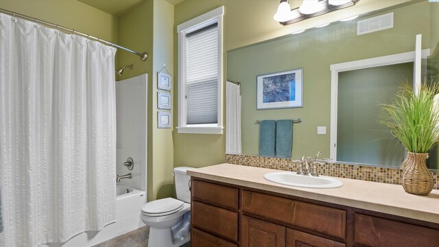 6102 Westmoreland Ln, Pasco, WA 99301 - bathroom with tasteful backsplash, vanity, and shower / bath combination with curtain