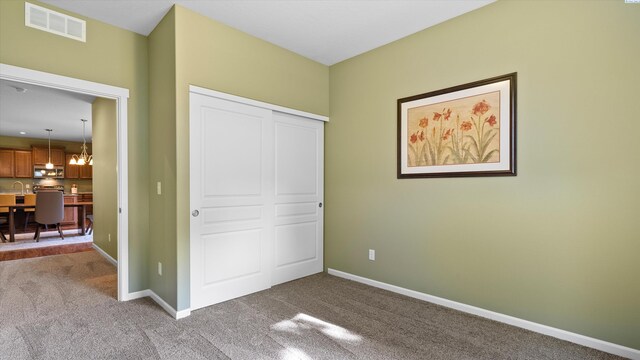 6102 Westmoreland Ln, Pasco, WA 99301 - unfurnished bedroom with carpet floors and a closet
