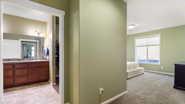 6102 Westmoreland Ln, Pasco, WA 99301 - full bathroom featuring vanity, connected bathroom, and a walk in closet