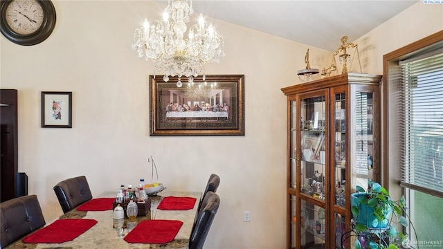 235 E Lilac Pl, Othello, WA 99344 - dining room with a chandelier and vaulted ceiling