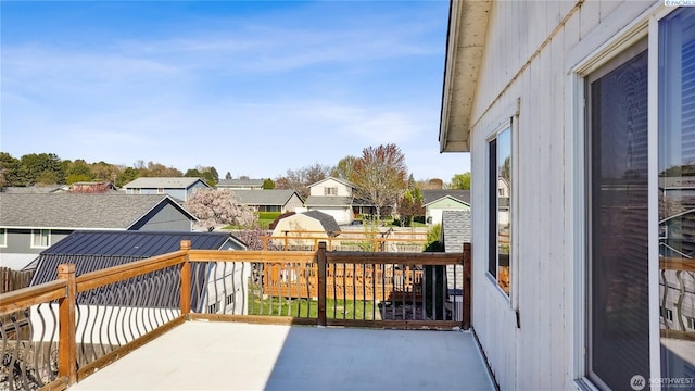 235 E Lilac Pl, Othello, WA 99344 - balcony with a residential view and a patio