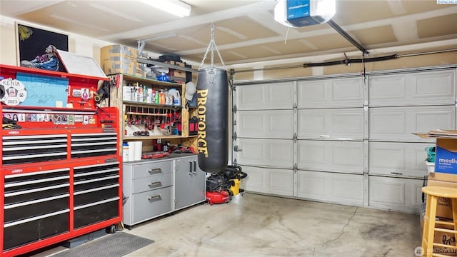 235 E Lilac Pl, Othello, WA 99344 - garage featuring a garage door opener