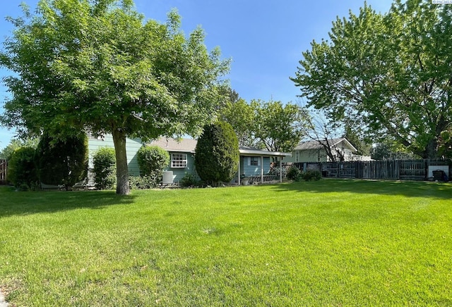 view of yard with fence