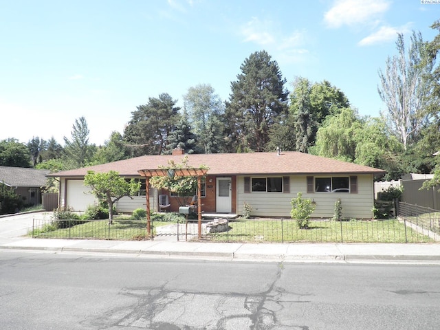 single story home with a garage and a front yard