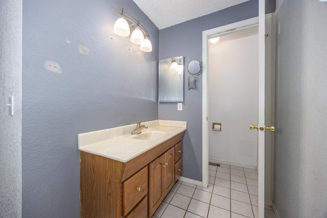 706 W 42nd Ave, Kennewick, WA 99337 - bathroom with vanity, tile patterned floors, and baseboards