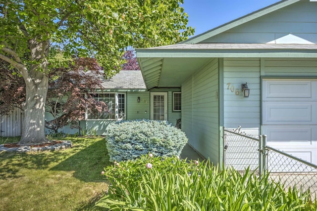 706 W 42nd Ave, Kennewick, WA 99337 - view of home's exterior featuring an attached garage