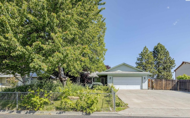 706 W 42nd Ave, Kennewick, WA 99337 - ranch-style house with a garage and driveway
