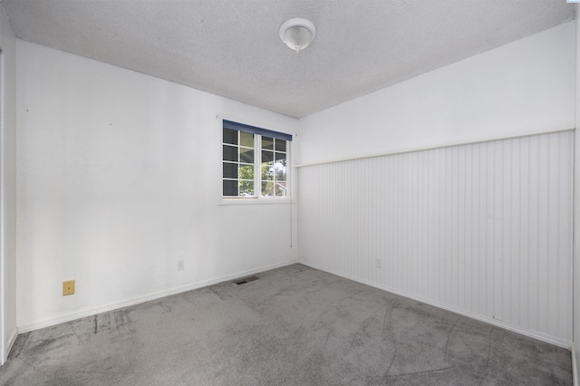 706 W 42nd Ave, Kennewick, WA 99337 - empty room with carpet, baseboards, and a textured ceiling