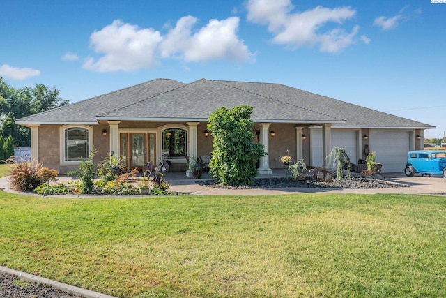 ranch-style house with a garage, a porch, and a front lawn