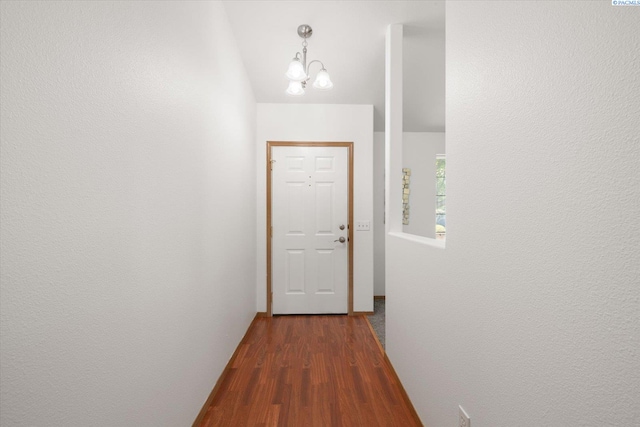 4607 Yuma Dr, Pasco, WA 99301 - doorway featuring dark wood-type flooring and a chandelier