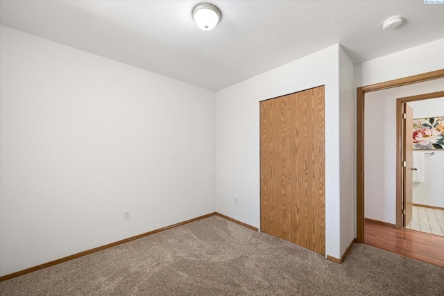 4607 Yuma Dr, Pasco, WA 99301 - unfurnished bedroom with carpet flooring, baseboards, and a closet