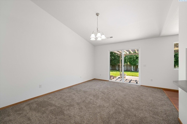 4607 Yuma Dr, Pasco, WA 99301 - empty room with a chandelier, baseboards, carpet, and lofted ceiling