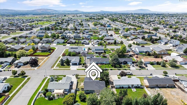 4607 Yuma Dr, Pasco, WA 99301 - aerial view of property's location featuring nearby suburban area and a mountainous background
