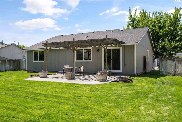 4607 Yuma Dr, Pasco, WA 99301 - rear view of house with a pergola, a shingled roof, and a patio area