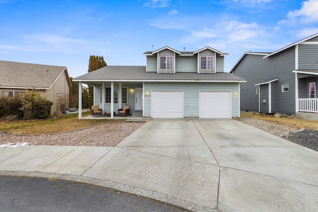 view of front of property with driveway, covered porch, an attached garage, and roof with shingles