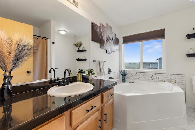 full bath featuring marble finish floor, visible vents, vanity, and a bath