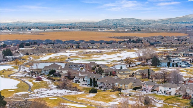 drone / aerial view with a residential view and a mountain view