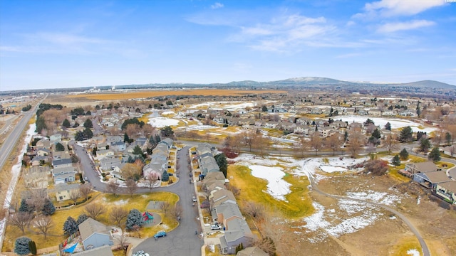 drone / aerial view with a residential view and a mountain view