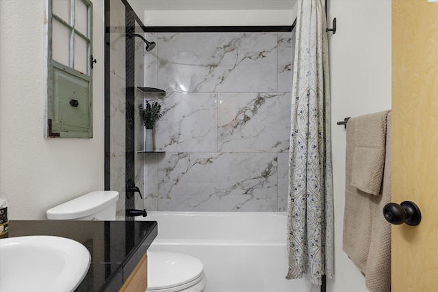 bathroom with toilet, shower / bath combo with shower curtain, and a sink