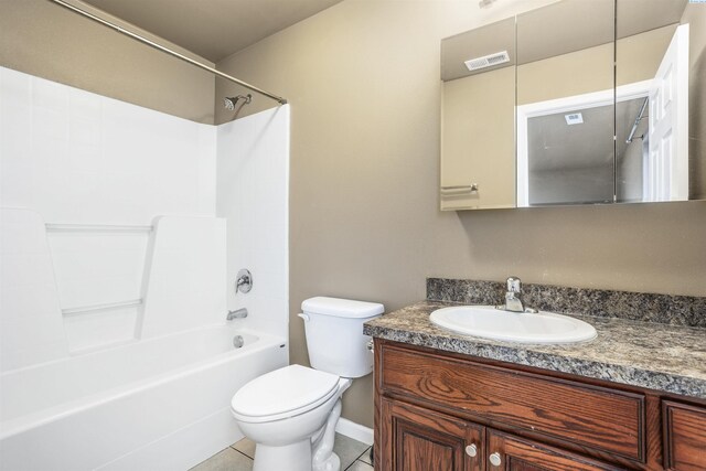 1408 Singh Ln, Sunnyside, WA 98944 - full bathroom featuring vanity, tile patterned flooring, bathtub / shower combination, and toilet