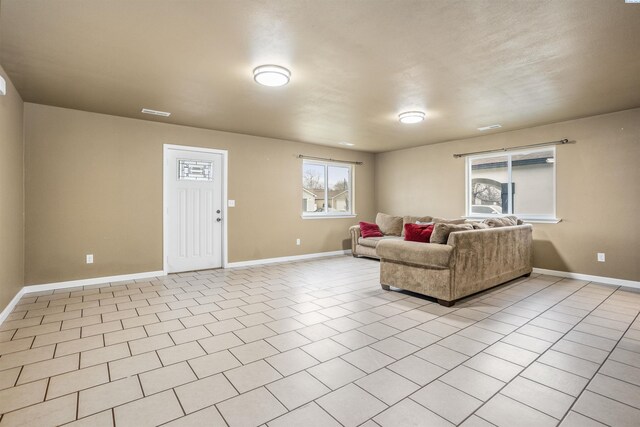 1408 Singh Ln, Sunnyside, WA 98944 - living room with light tile patterned floors
