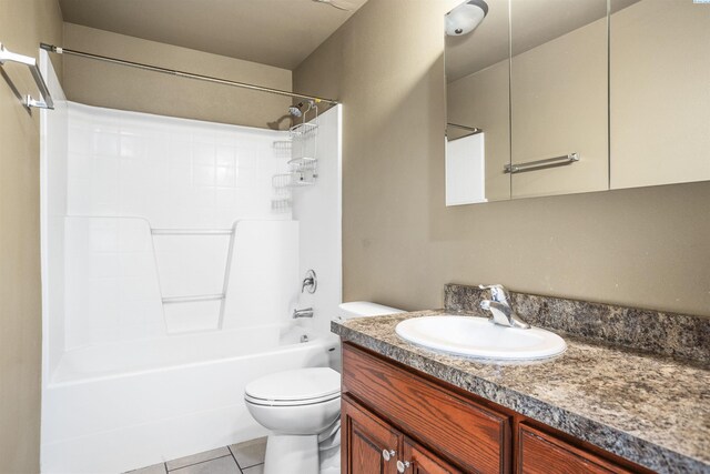 1408 Singh Ln, Sunnyside, WA 98944 - full bathroom with shower / tub combination, vanity, tile patterned floors, and toilet