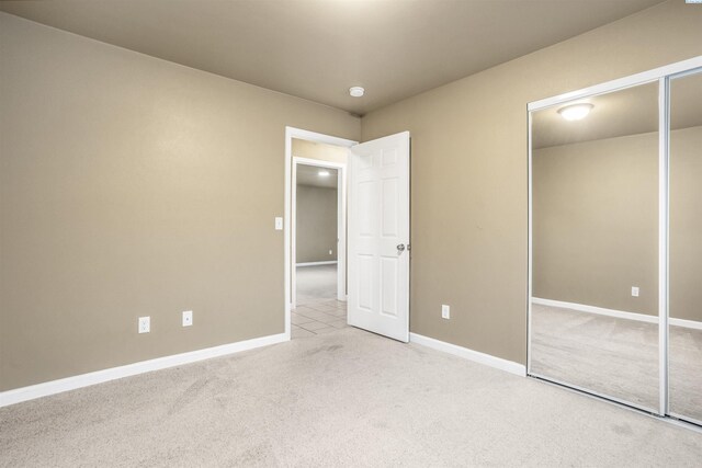 1408 Singh Ln, Sunnyside, WA 98944 - unfurnished bedroom featuring light colored carpet and a closet