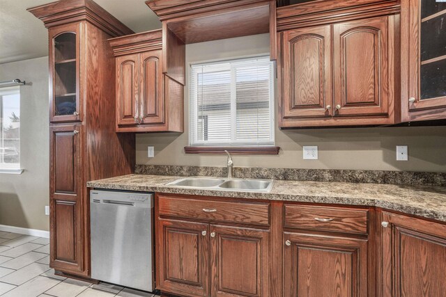 1408 Singh Ln, Sunnyside, WA 98944 - kitchen featuring light tile patterned floors, dishwasher, sink, and a wealth of natural light