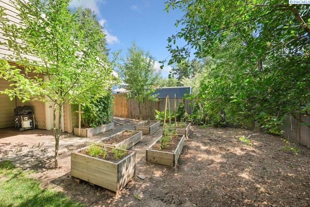 835 SE Spring St, Pullman, WA 99163 - fenced backyard with a garden