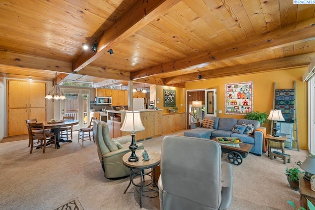 835 SE Spring St, Pullman, WA 99163 - living area with light colored carpet, a wooden ceiling with exposed beams, and a chandelier