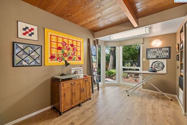 835 SE Spring St, Pullman, WA 99163 - misc room with light wood-style flooring and a wood ceiling with exposed beams