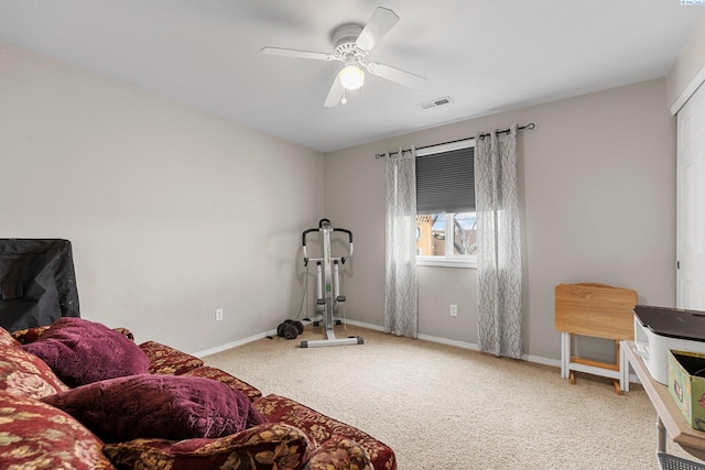 5504 Koufax Ln, Pasco, WA 99301 - exercise room featuring carpet floors, ceiling fan, and baseboards