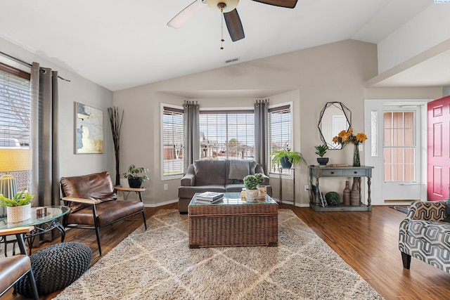 5504 Koufax Ln, Pasco, WA 99301 - living room with vaulted ceiling, wood finished floors, a ceiling fan, and baseboards