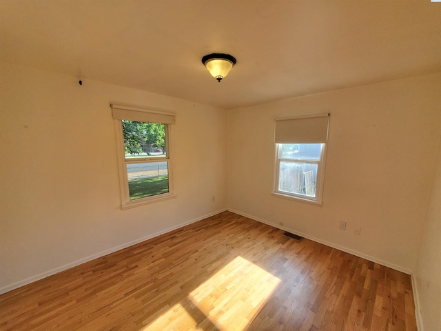 3011 W Hood Ave, Kennewick, WA 99336 - empty room with light wood-type flooring and baseboards