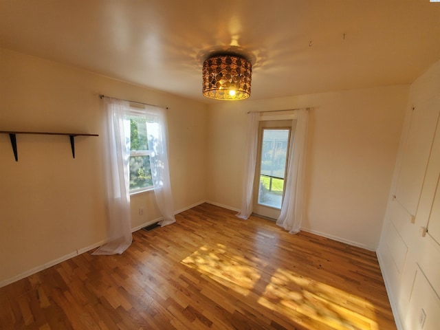 3011 W Hood Ave, Kennewick, WA 99336 - spare room with light wood-style flooring and baseboards