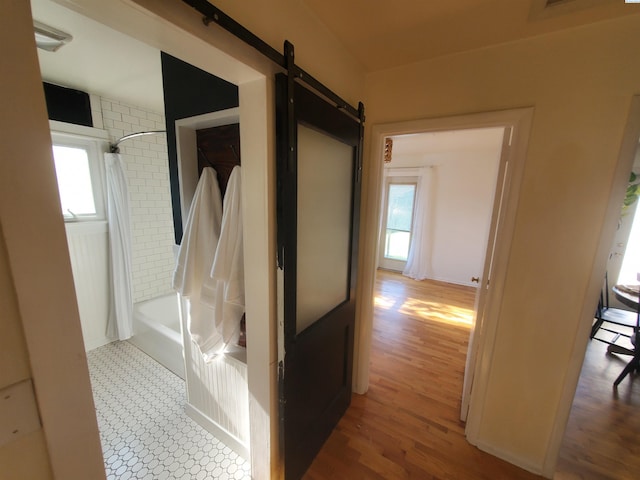 3011 W Hood Ave, Kennewick, WA 99336 - bathroom with shower / tub combo with curtain and wood finished floors