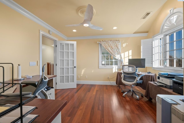 home office featuring a ceiling fan, visible vents, baseboards, hardwood / wood-style flooring, and crown molding