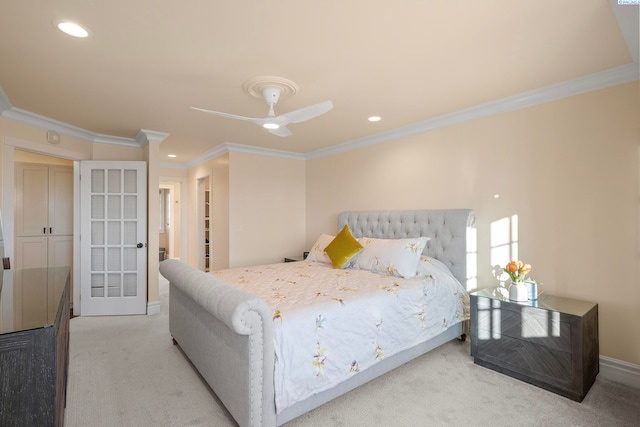 bedroom featuring baseboards, recessed lighting, ceiling fan, ornamental molding, and light carpet