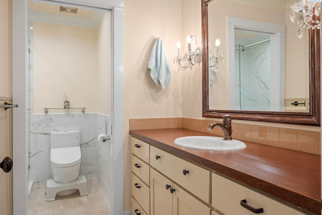 full bath with toilet, tile walls, vanity, and crown molding